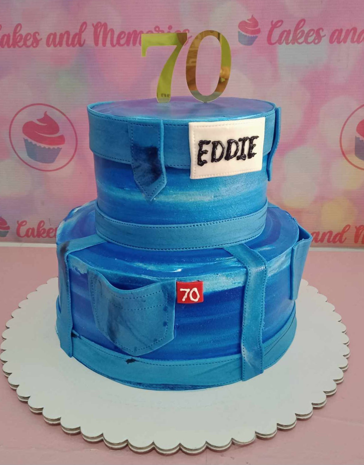 Celebrate a milestone birthday with this striking 2-tier Jeans Cake, featuring blue hues and intricate details inspired by Levi's maong pants. Perfect for honoring lolo or lola's 60th, 70th, or 80th birthday celebrations.