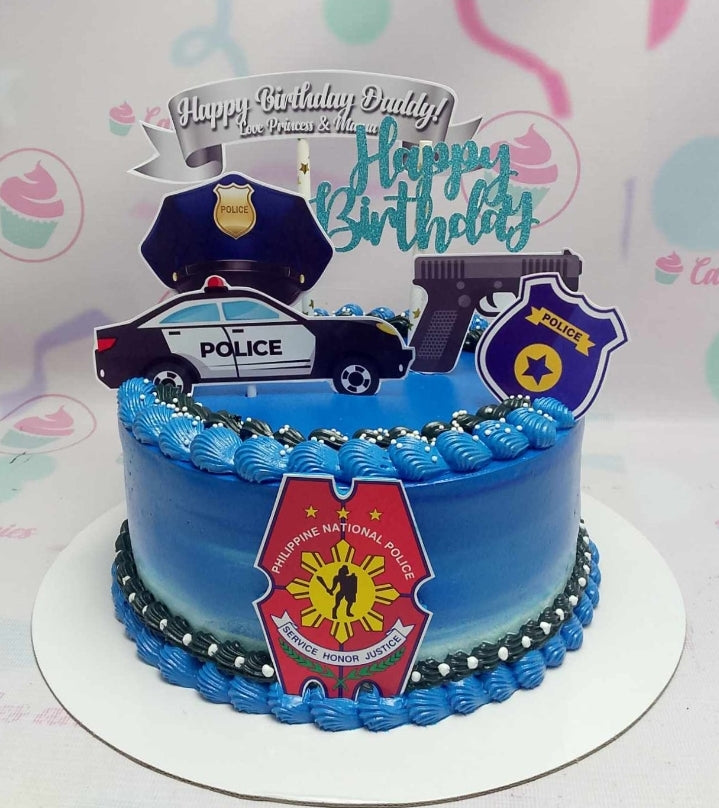 This custom Police Cake features a striking blue design, complete with a PNP police cap and printout toppers showcasing badges and police cars. Perfect for celebrating a birthday for any daddy, papa, tito, lolo, or kuya in law enforcement.