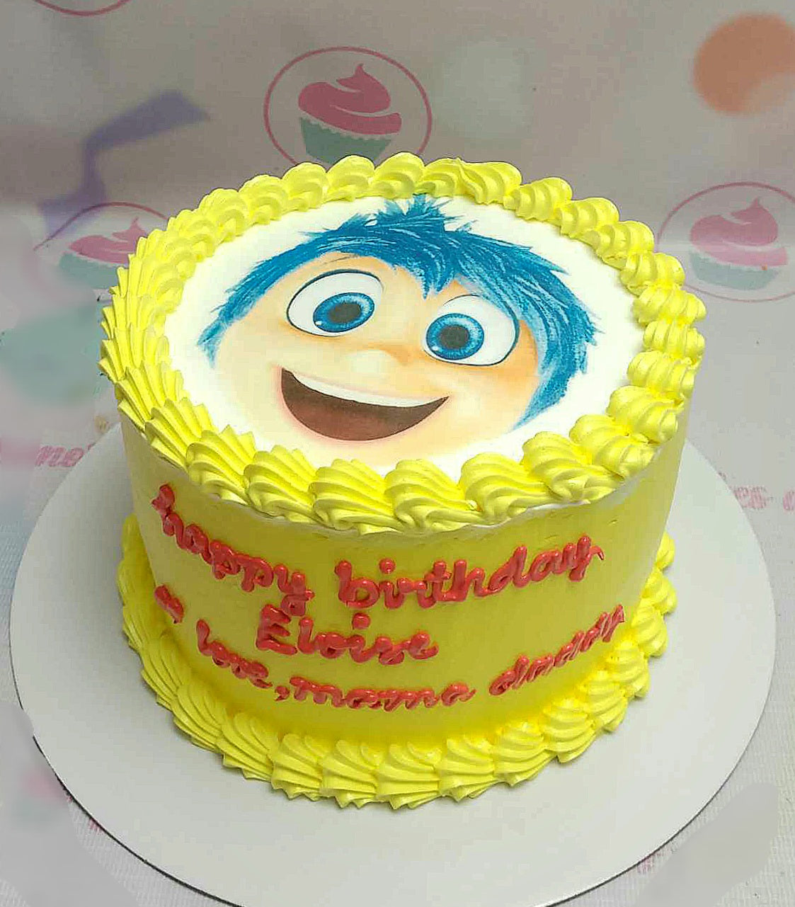 Celebrate the birthday girl with a delightful Inside Out Cake featuring joyful yellow swirls and an edible photo capturing the essence of the Pixar movie. This charming 1-tier design is perfect for any fan of Inside Out.