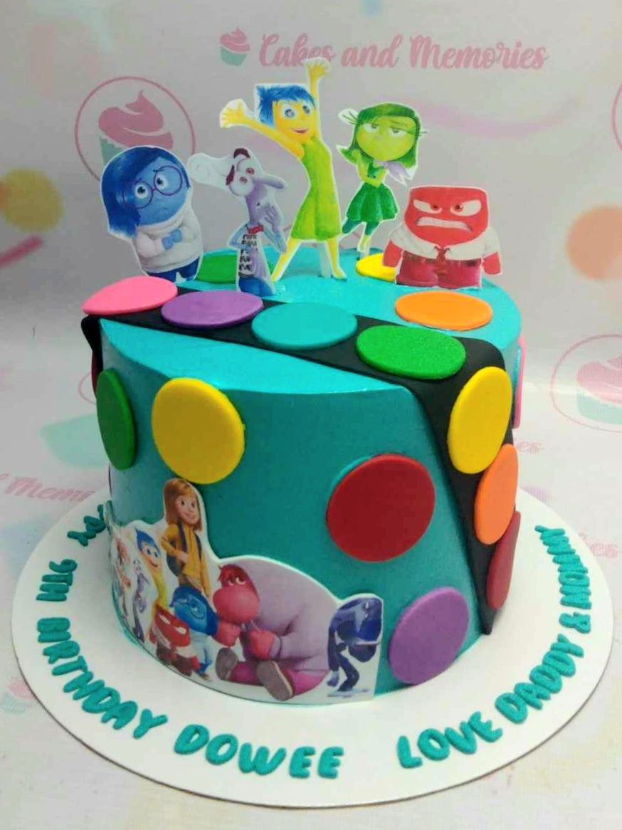 Introducing our vibrant Inside Out Cake, adorned in teal and green, capturing the essence of emotions with its colorful rainbow layers. This one-tier masterpiece is inspired by Pixar's animated film, showcasing joy, sadness, anger, disgust, and more in a playful, eye-catching design.