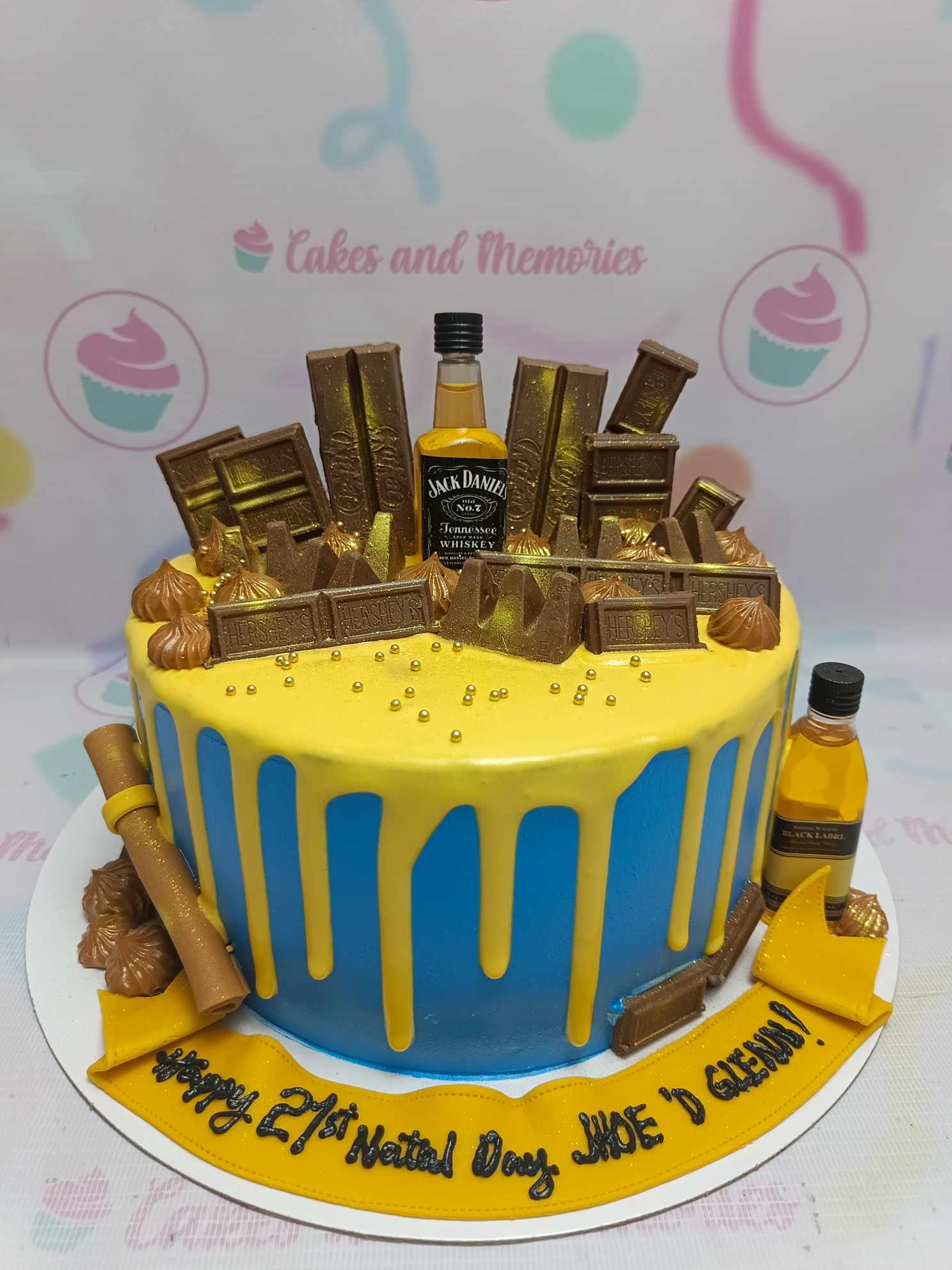 Celebrate a special 21st birthday with this stunning Drinks Cake, featuring vibrant blue icing, a luxurious gold drip, and a delicious assortment of chocolates including KitKat, Toblerone, and Hershey's. Perfect for the gentlemen in your life, this one-tier masterpiece is designed to impress any dad or brother on Father's Day or any festive occasion.