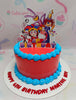 A colorful Digital Circus Cake featuring red and blue hues, decorated with cartoon digital circus characters, and topped with white sprinkles. Perfect for a 6th birthday celebration, it showcases printout toppers on a single tier design.