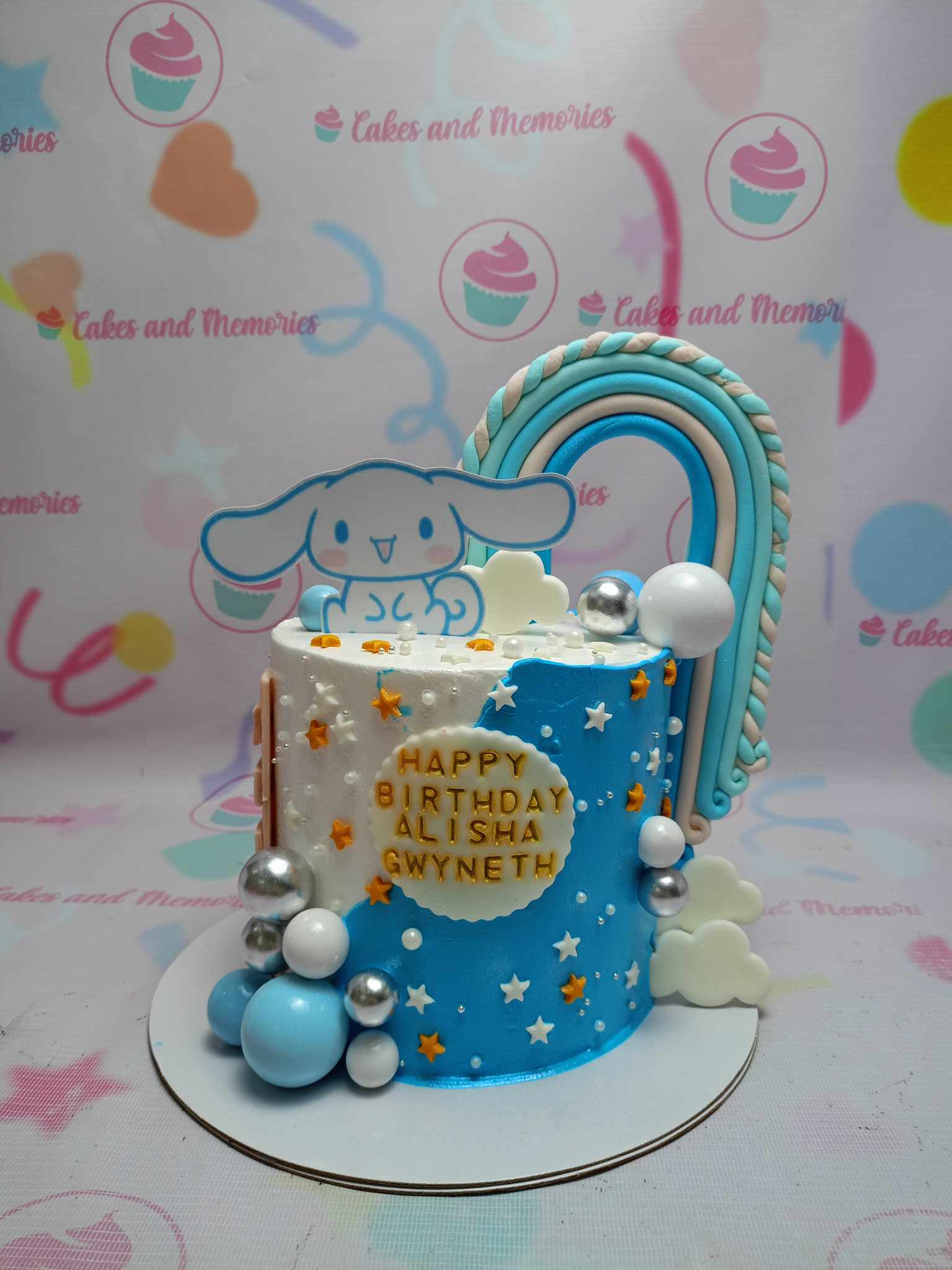 Elevate your celebrations with our stunning Cinnamoroll Cake, featuring a vibrant blue base adorned with a whimsical rainbow design, perfect for Sanrio fans. This delightful 1-tier cake brings the charm of Hello Kitty and friends to life!