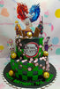 This Demon Slayer cake features a striking black and green checkered design with 2 tiers adorned with printout toppers of Tanjiro, Nezuko, and other beloved characters. Topped with cherry blossoms, chocolate bars, and Ferrero Rocher, it’s perfect for a happy birthday celebration with a fierce dragon theme.