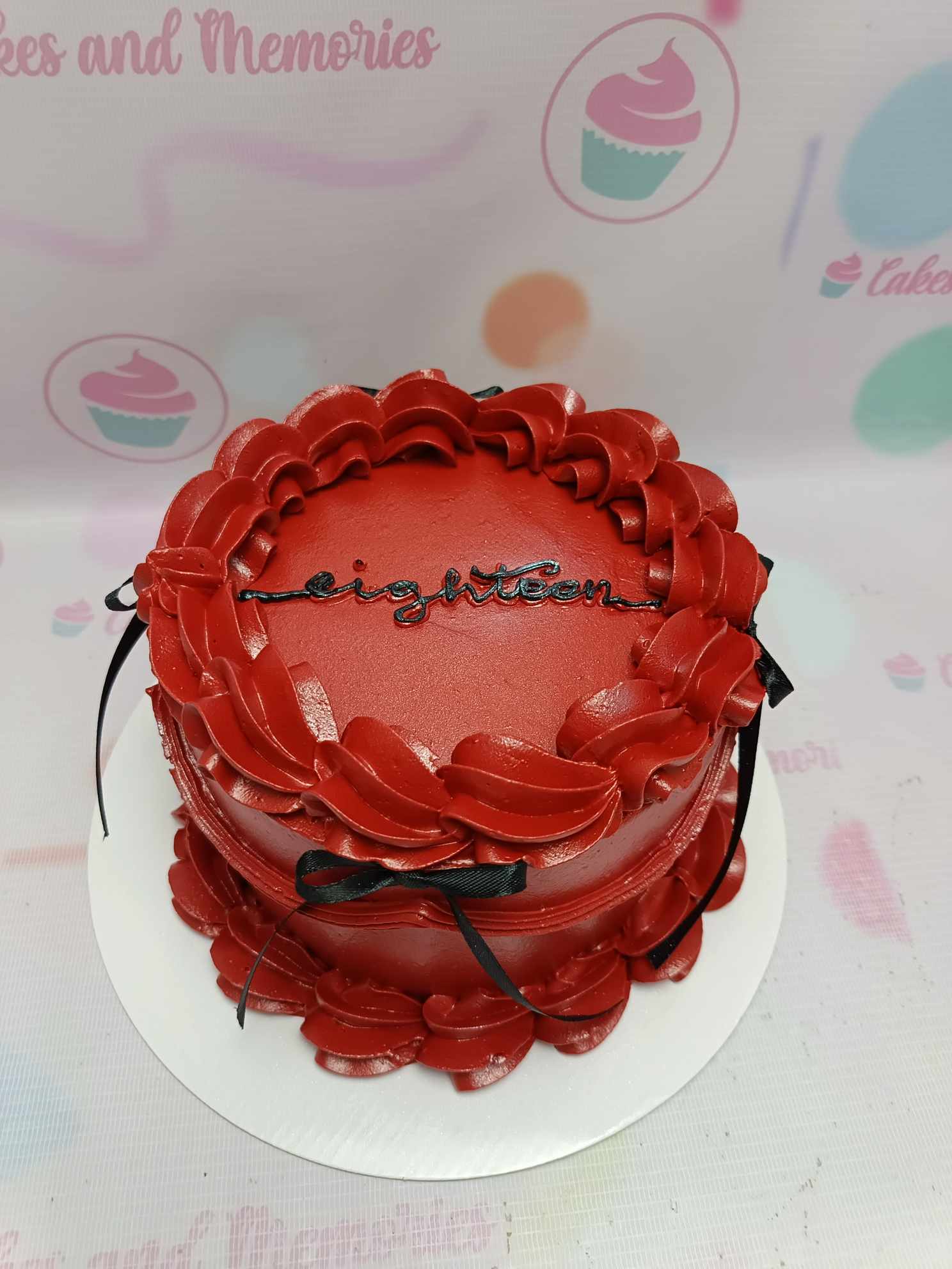 This stunning vintage-inspired Ribbon Cake features a striking red and black ribbon design, perfect for celebrating special occasions. Ideal as a customized gift for lola or lolo, this one-tier beauty makes a memorable addition to any birthday celebration.