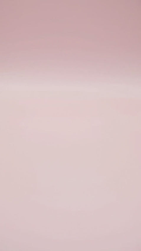 A single-tier, cream-colored, shaggy-piped animal cake decorated with pink fondant roses and a Happy Birthday Yami message.