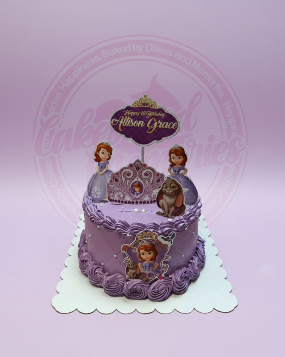 One-tier Sofia the First birthday cake with purple soft icing, edible prints of Sofia and Clover, and 'Happy 1st Birthday Alison Grace' topper.