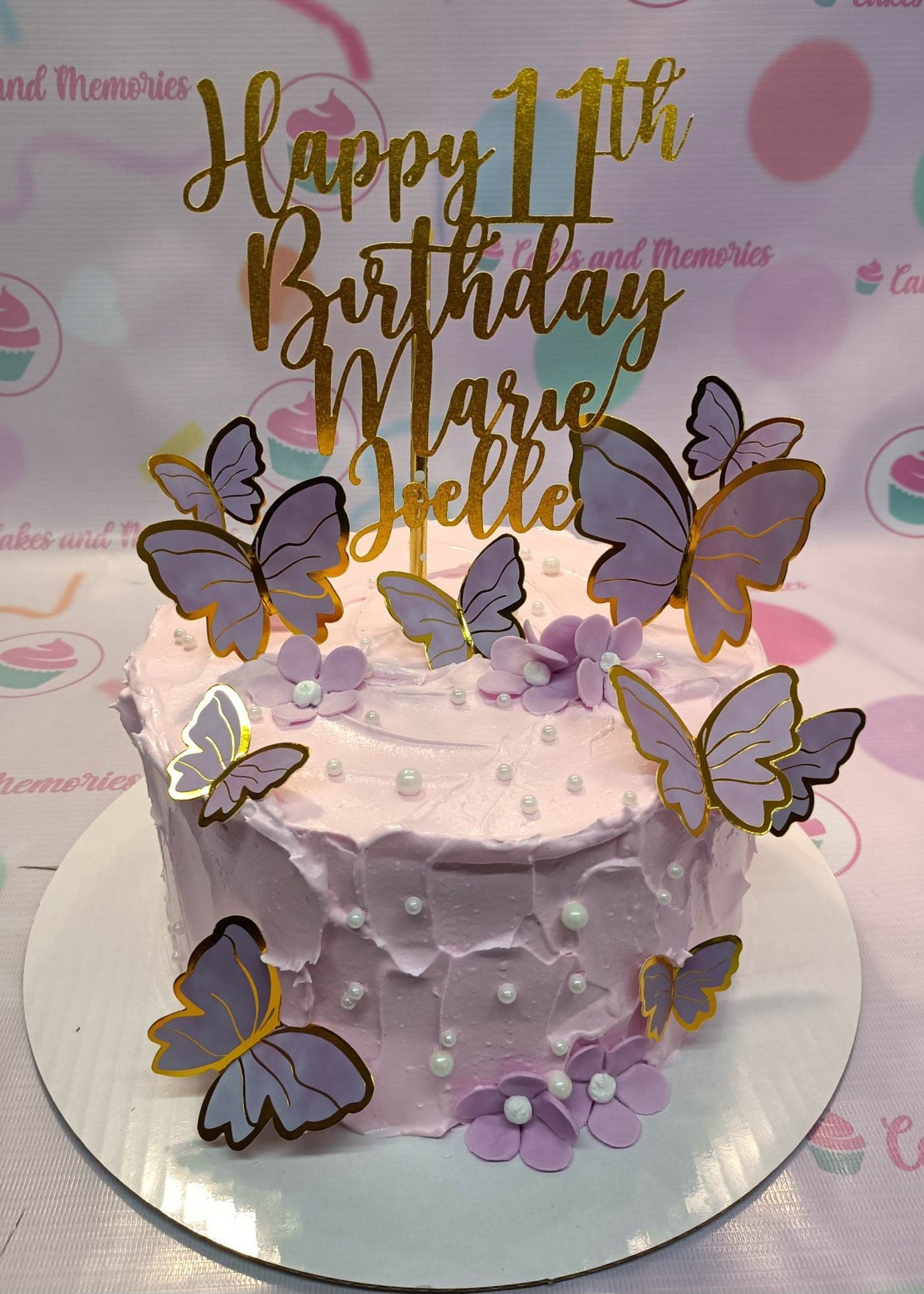 This beautiful Butterflies Cake is the perfect addition to any birthday celebration. With its pink and gold color palette, it's sure to delight any crowd. Handcrafted with love, each Butterfly Cake is customized to make it unique. This cake will make any birthday special and unforgettable.