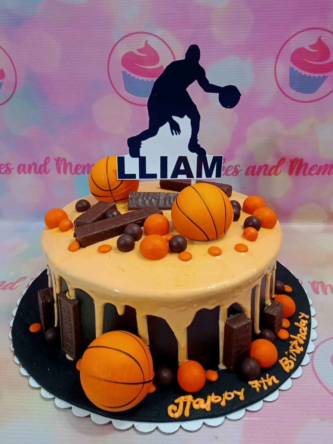 This custom decorated NBA and PBA themed cake is the perfect gift for the sports fan. It features a basketball design, with bright orange drip, and brown accents. Perfect for celebrating birthdays, or special occasions, for men, boys, brothers and dads!
