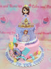 This Sofia the First birthday cake will make any princess's day special. Beautifully decorated with purple fondant and a variety of donuts and candies, this custom-made cake is a perfect way to commemorate a birthday. The cake is topped with a toy figure of Sofia The First for extra fun.
