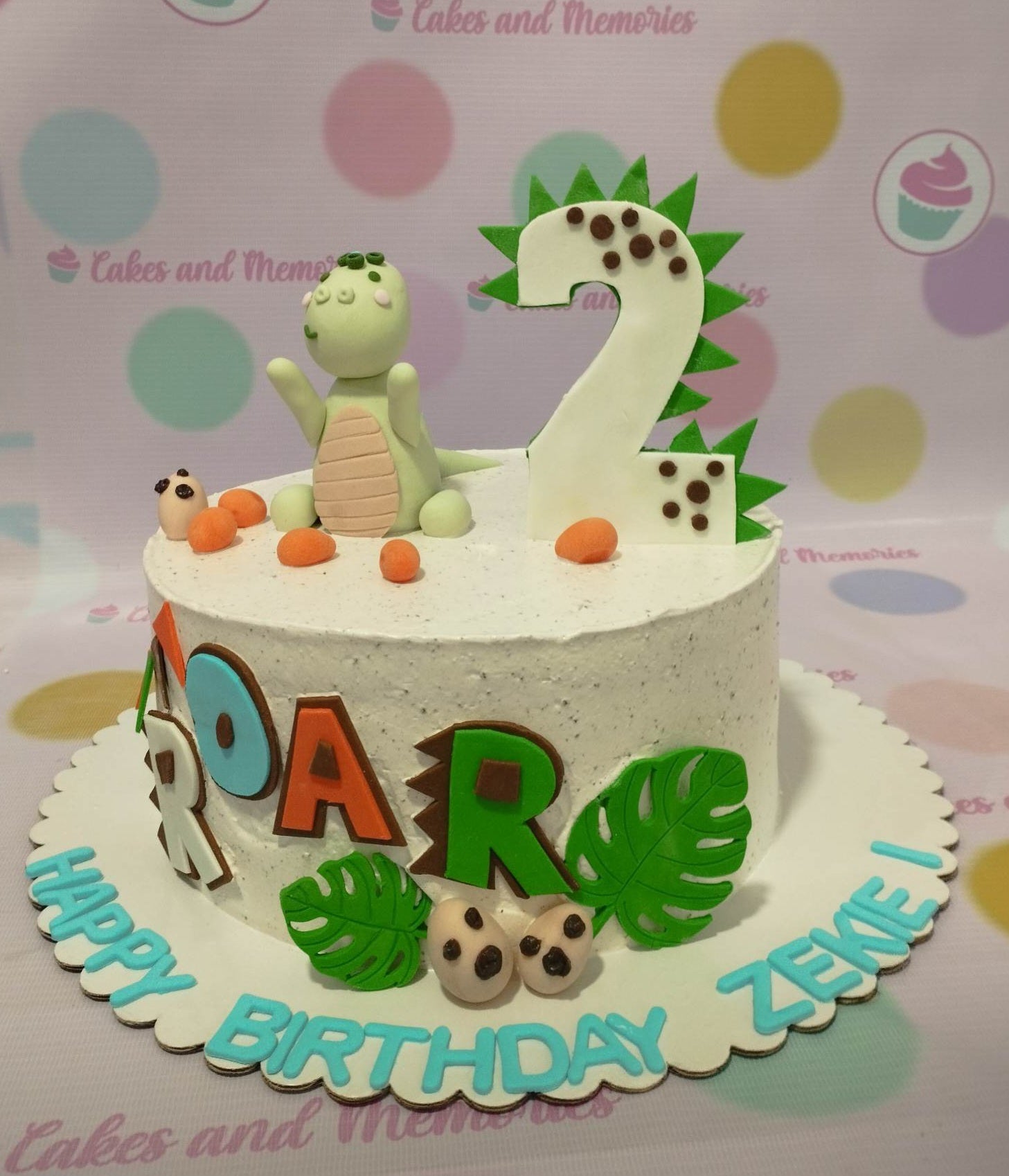 , Prehistoric

This Dinosaurs Cake is perfect for both kids and Jurassic fans alike. It is decorated with custom white, green and red designs, including a T-Rex, making it a perfect choice for your child's birthday cake. The quality of the cake is top-notch and it will capture the prehistoric theme perfectly.