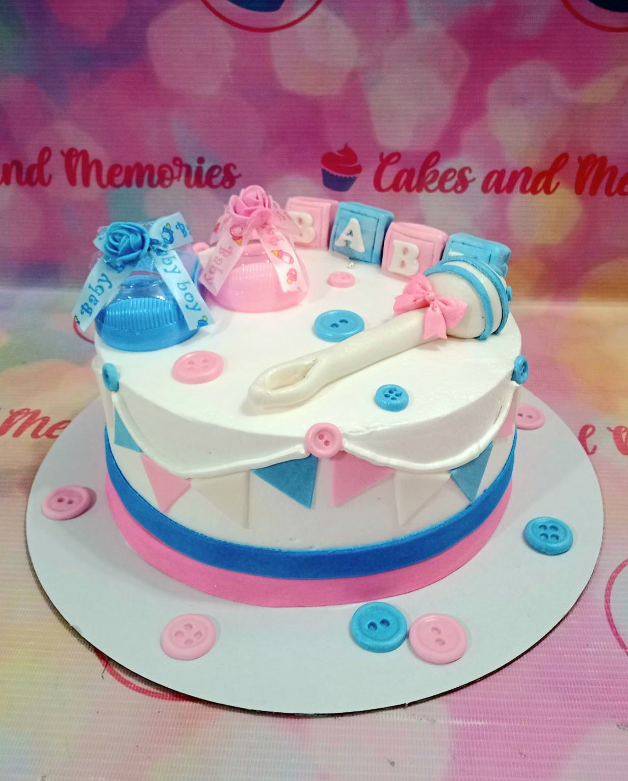 This gender reveal cake is custom-made for a special occasion! Featuring fondant pieces in shades of blue and pink, along with charming baby shoes and other decorative details, this cake will make a great centerpiece for your baby shower or gender reveal party. The intricate details and beautiful presentation of this cake is sure to make a lasting impression.