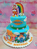 This handcrafted Jolibee themed birthday cake is a stunning sight. It features beautiful blue, rainbow and colorful decorations of Jolibee and his friends, Twirly and Hetty Spaghetti. It is perfect for any Pinoy birthday celebration!