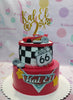 This custom decorated Cars (Pixar) Cake is an ideal way to celebrate birthdays and special days. The cake is decorated with racing checkered flag and red lightning McQueen plus route 66 stickers for a classic Cars look. This cake also comes with a personalized toy lightening mcqueen, making it the perfect customized cake for your special day.