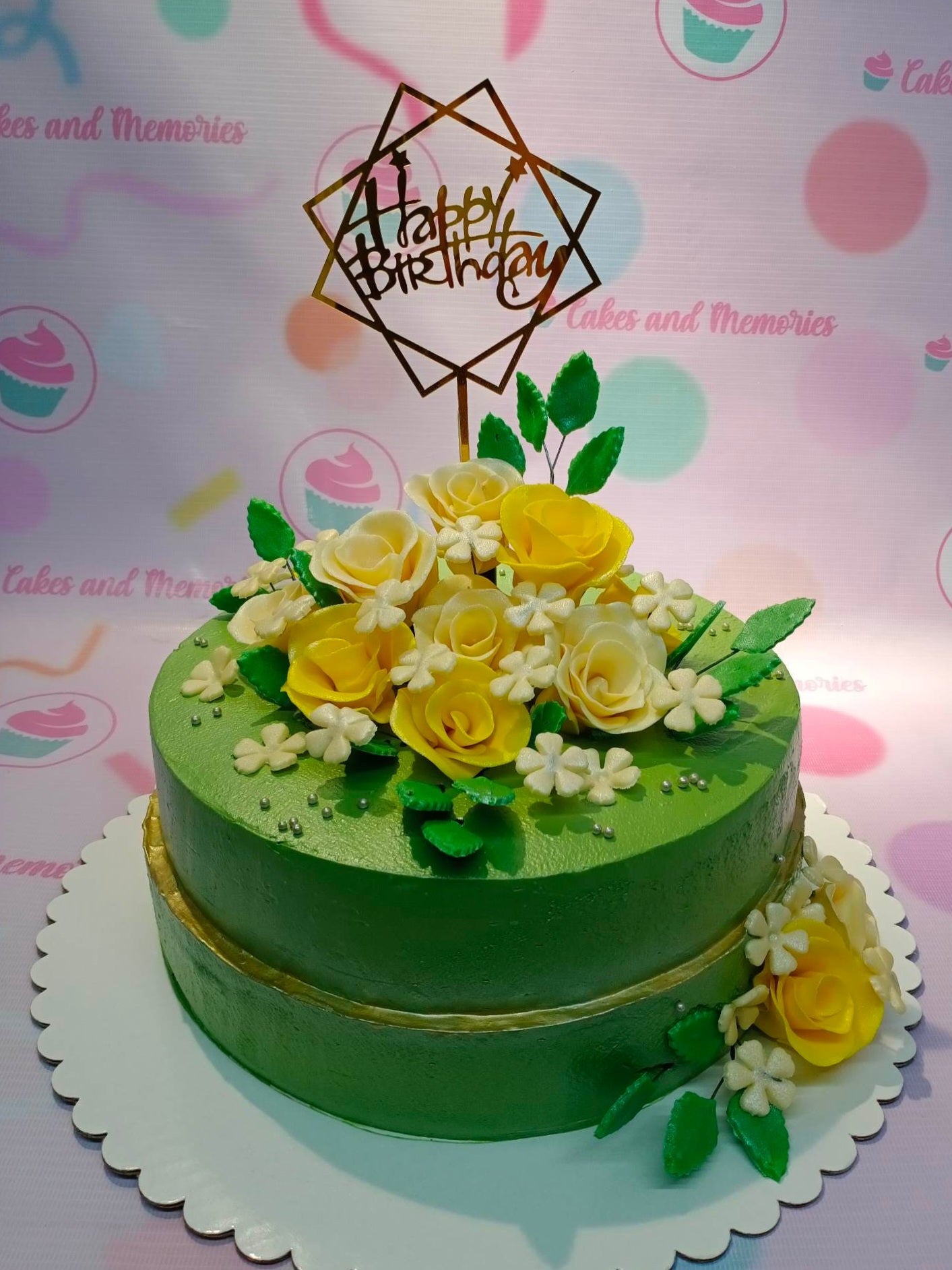 Roses

This stunning custom decorated cake is perfect for a special occasion like an 18th birthday. Beautifully crafted with an array of green, yellow and gold flowers, this floral cake is ideal for celebrating a 50th birthday or honoring a special mother. Every flower is professionally placed, ensuring an elegant and sophisticated look that is sure to impress.