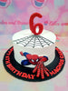 This Spiderman-themed cake is sure to delight any superhero enthusiast! This custom-decorated cake is perfect for special occasions, and crafted from quality ingredients. It features a color palette of white, red and black, and is adorned with webs, printouts and the iconic Avengers symbol. Make any of birthdays special with this unique and decoratively crafted cake!