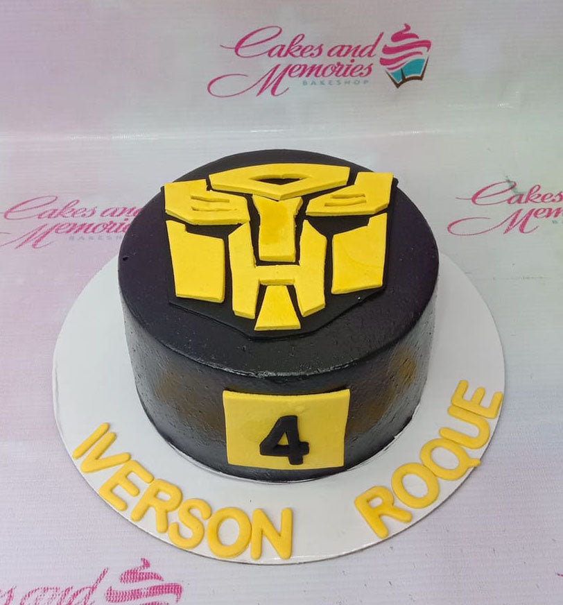 Transformers Cake with edible images of various characters