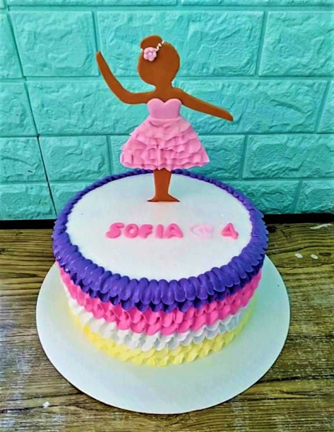 A Beautiful Buttercream Layer Cake Decorated With Ballerina Cake Topper The  Concept Of The Desserts For The Celebrating Stock Photo - Download Image  Now - iStock