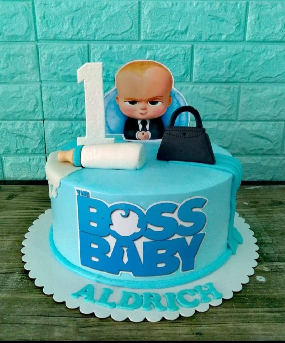 Boss baby theme cake for 1st birthday with all edible details , chocolate  lotus cake inside,place your orders on my wtsapp @03315536974… | Instagram