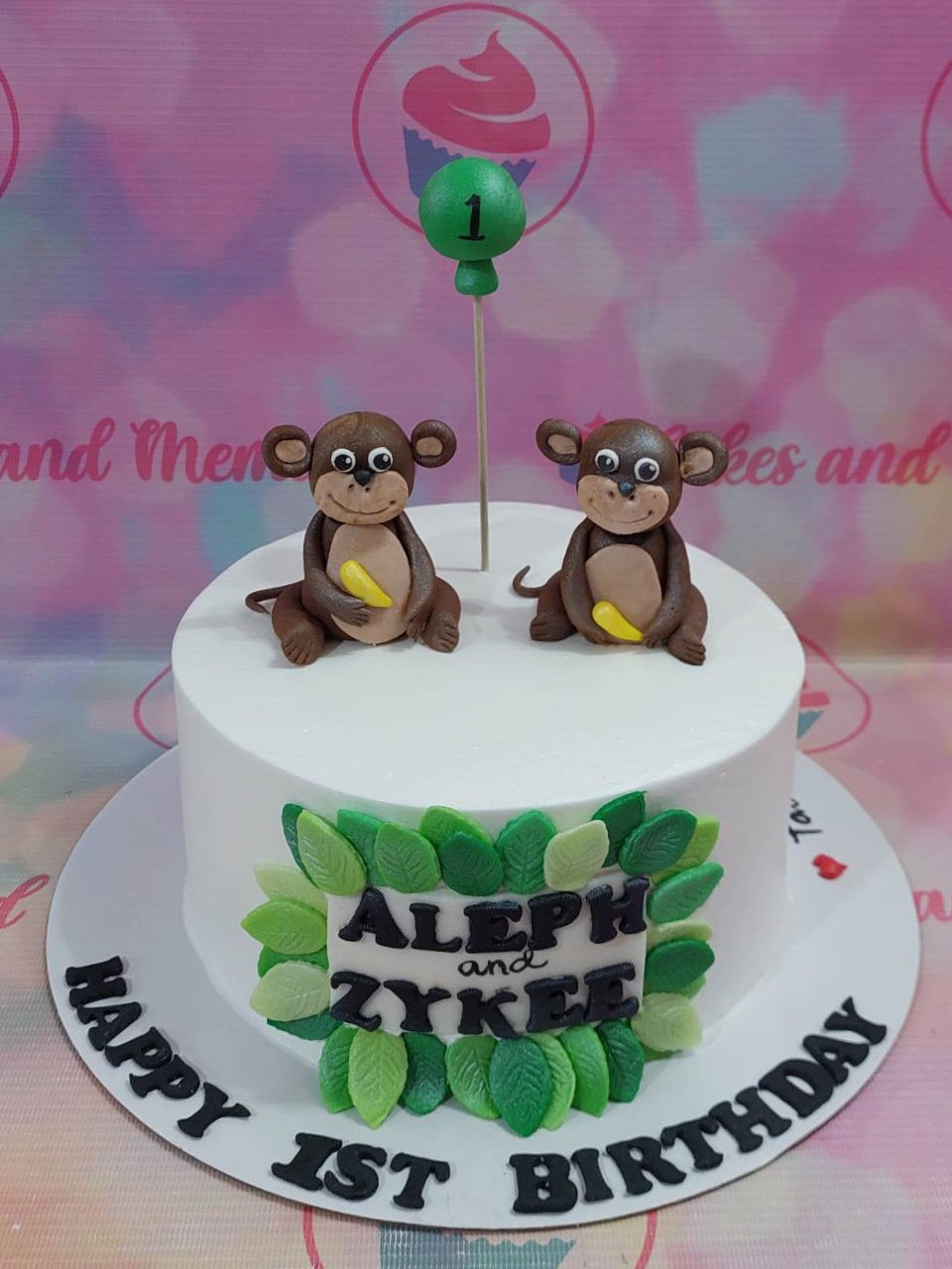 This jungle-themed Safari Cake is great for your little one's 1st birthday! It features white icing along with humorous animals like monkeys, giraffe and lion that bring the wild life to life. The custom-made cake is made with high quality ingredients and is perfect for any safari or outdoor-themed celebration!