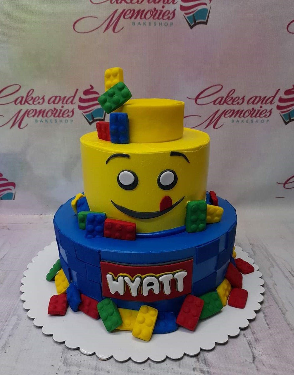Two Tier Lego Themed Birthday Cake | Lego birthday cake, Themed birthday  cakes, Lego themed cake