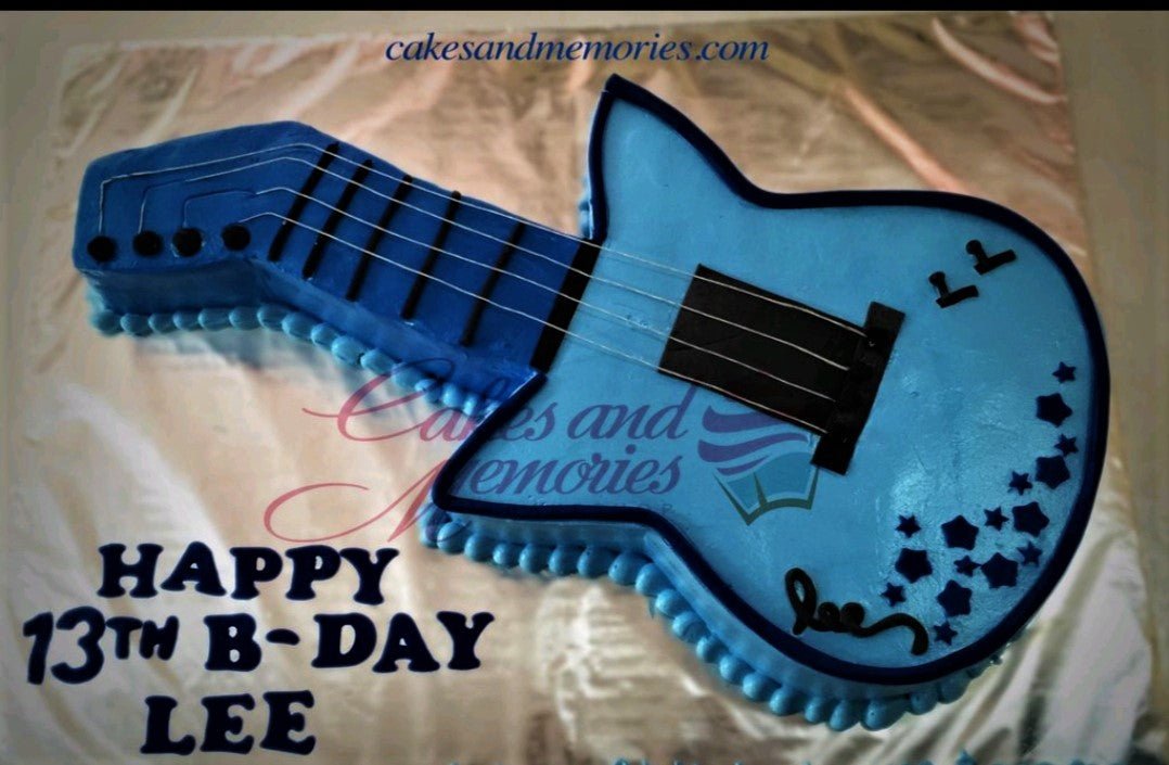 Blue acoustic guitar cake