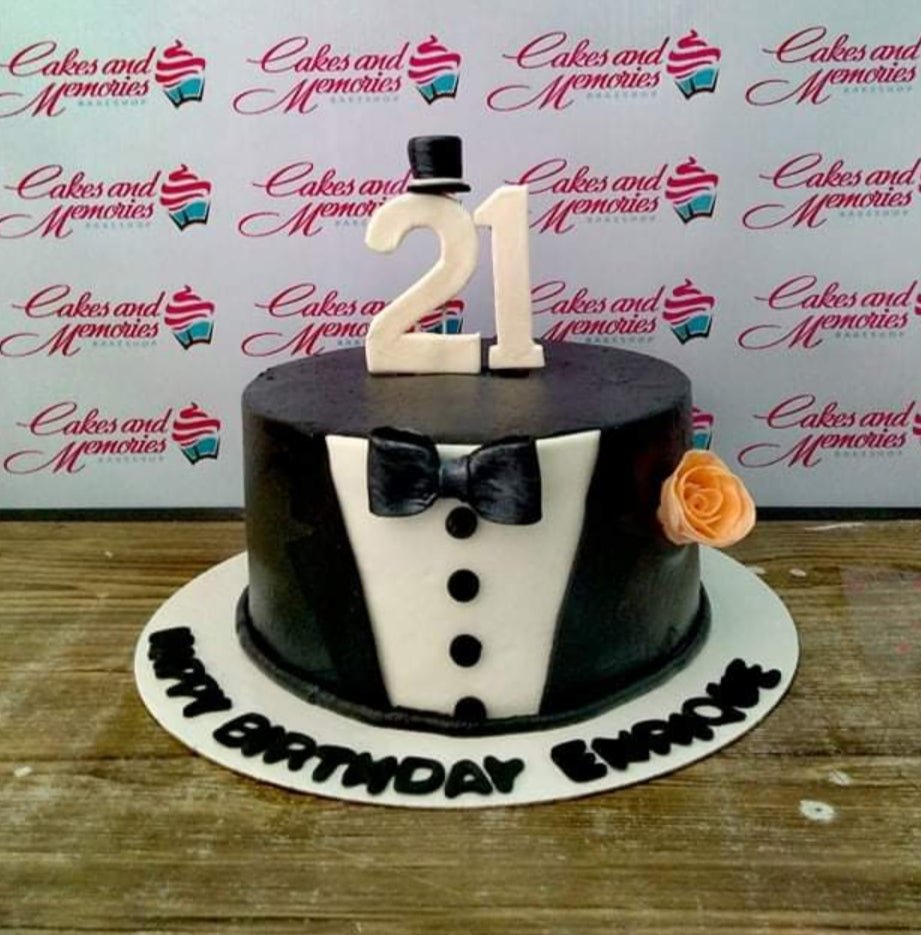 Two Male Figurines Dressed In Tuxedos Atop A White Cake Stock Photo -  Download Image Now - iStock