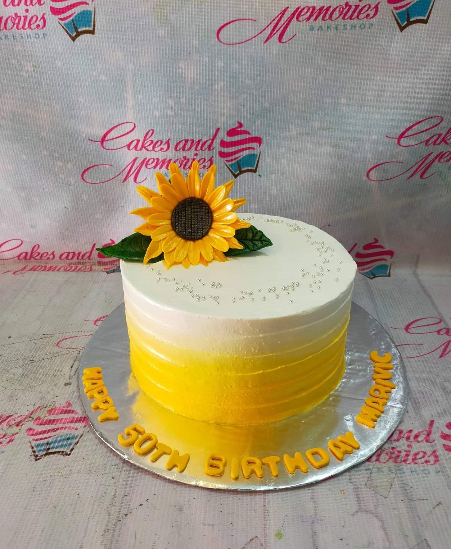 Two-tiered Textured Sunflower Wedding Cake - Tasty Pastry Bakery Tallahassee